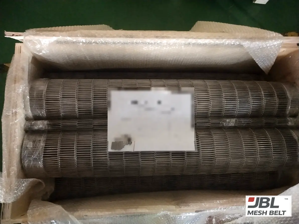 10 m rolls packed in a lined crate, spare parts bagged (label blurred)