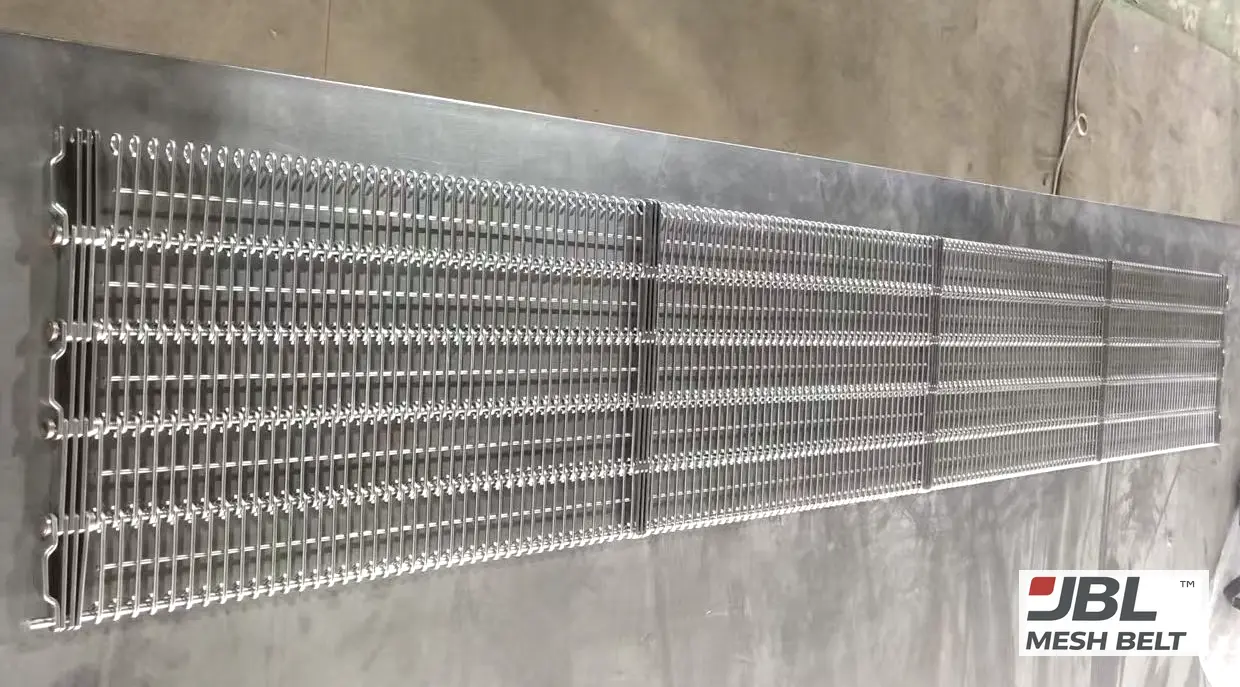 Eye link belt sample sections with flat-link edges laid out for checking