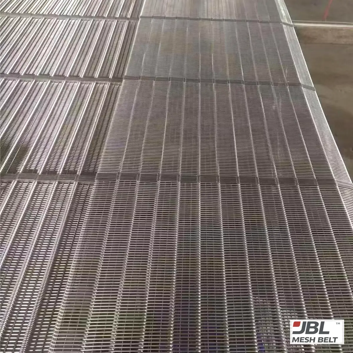 Eye link belt laid out before shipment
