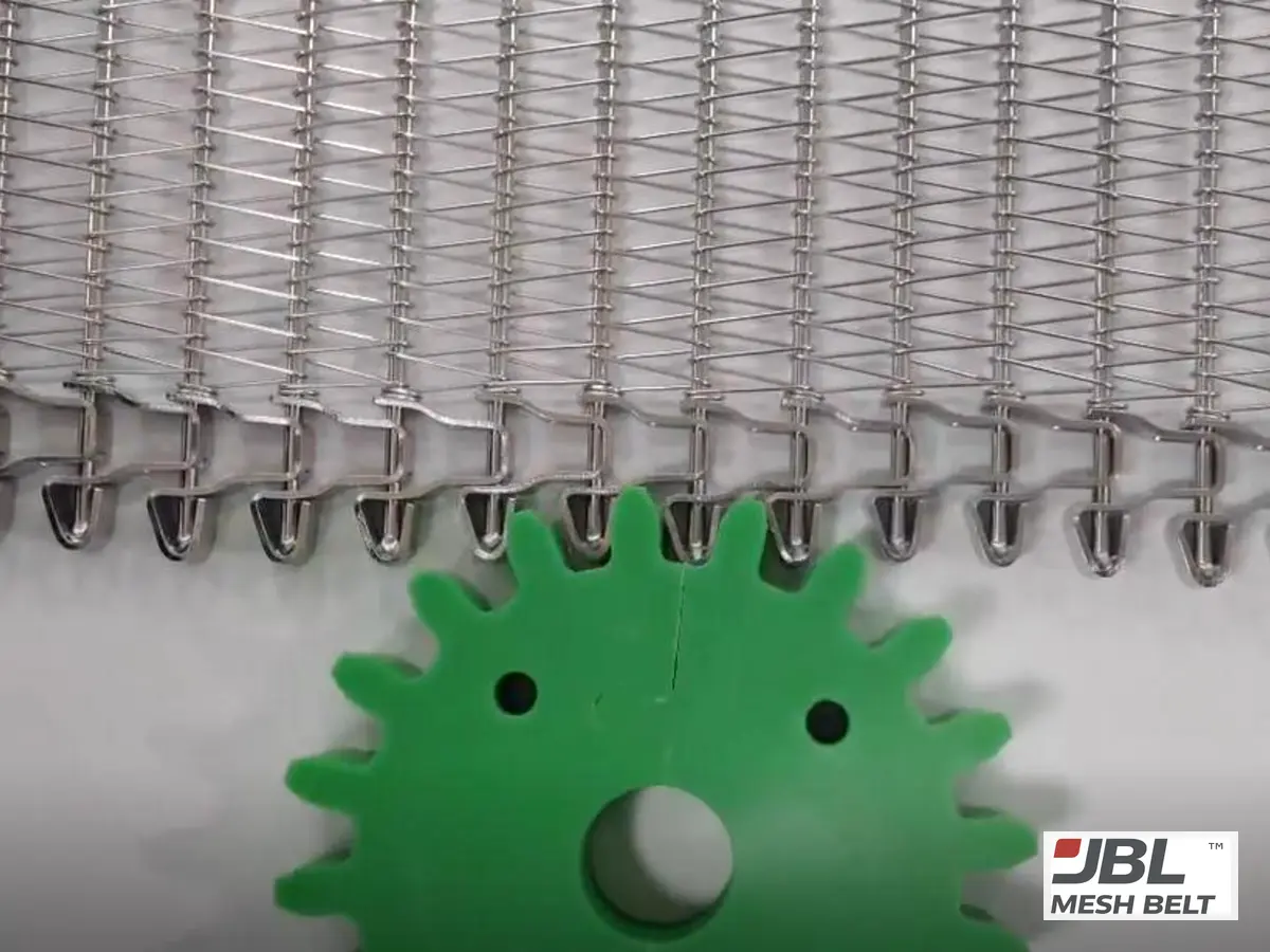 JBL Mesh Belt side-driven belt running on a sprocket to check tooth engagement before shipment